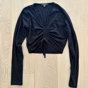 black cinch long sleeve crop top